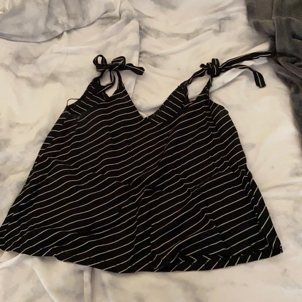 Stripped shirt with tied strands